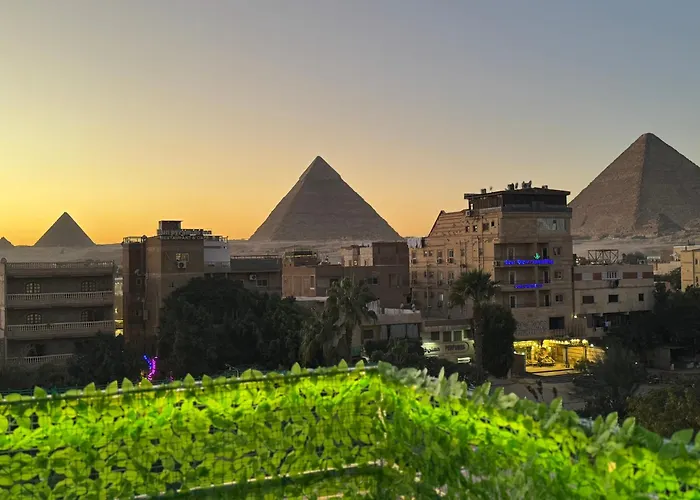 Nefertiti Pyramids View