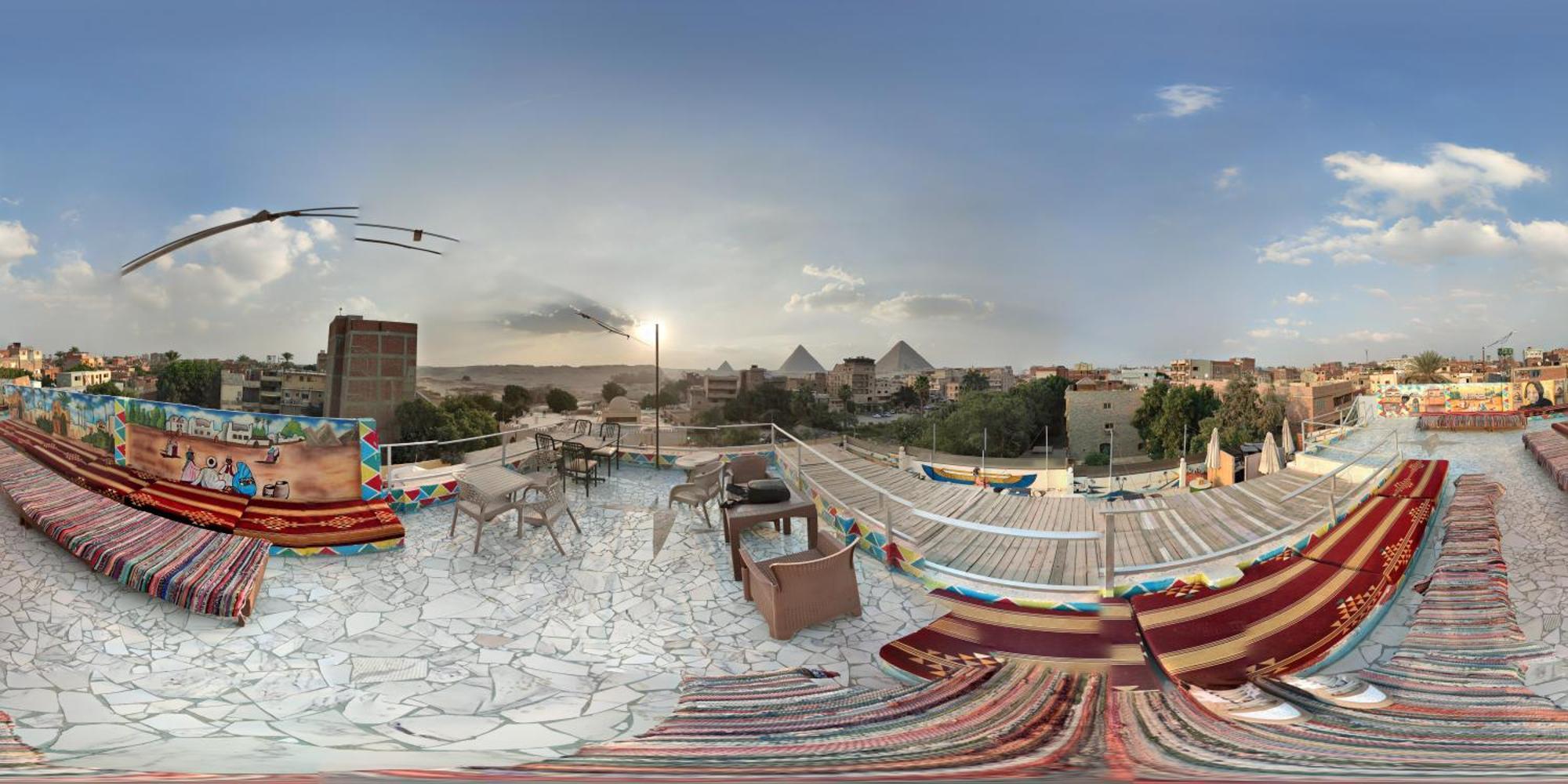 Nefertiti Pyramids View