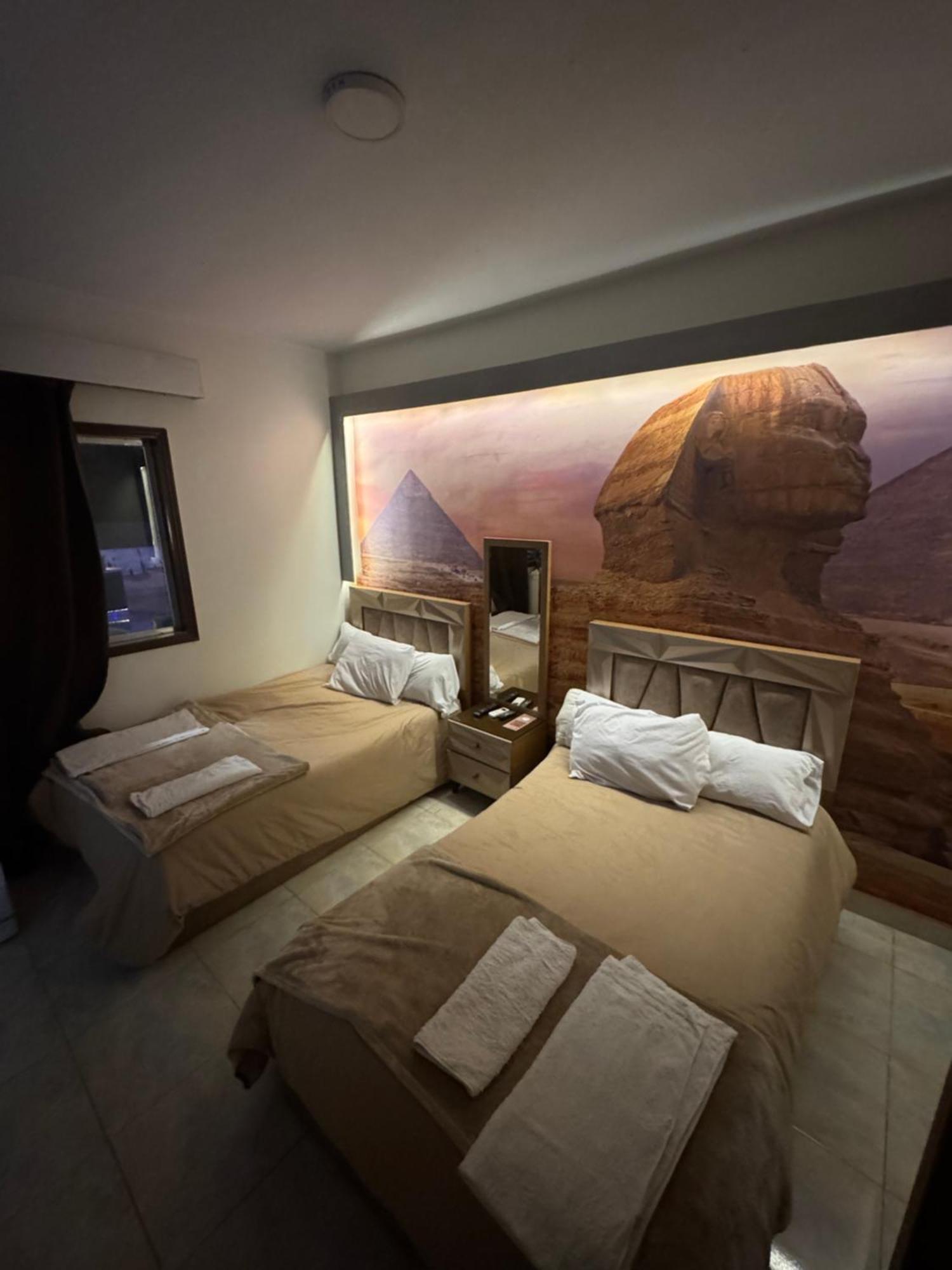 Nefertiti Pyramids View